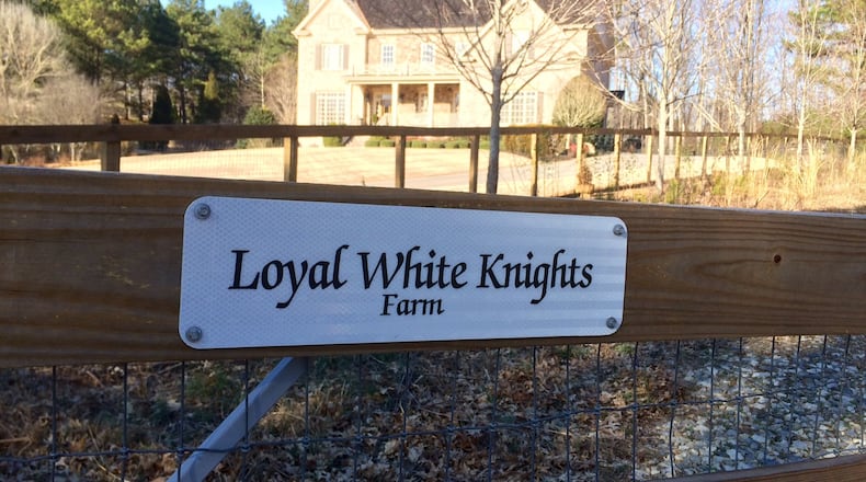 Sign marking the so-called Klan farm that popped up in a Milton zoning dispute. Photo by Bill Torpy.