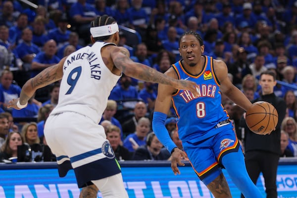 Oklahoma City Thunder forward Jalen Williams (8) drives against Minnesota Timberwolves guard Nickeil Alexander-Walker (9) during the first half of Game 2 of an NBA basketball Western Conference Finals playoff series Thursday, May 22, 2025, in Oklahoma City. (AP Photo/Nate Billings)