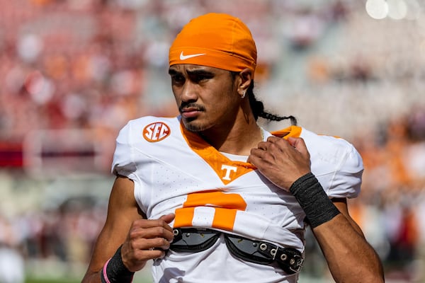 FILE - Tennessee quarterback Nico Iamaleava (8) warms up before an NCAA college football game against Alabama, Saturday, Oct. 21, 2023, in Tuscaloosa, Ala. (AP Photo/Vasha Hunt, File)