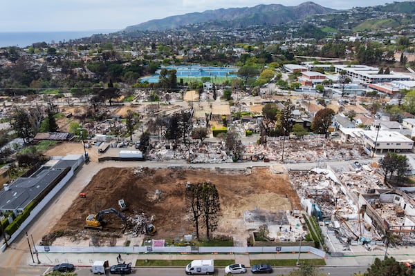 The land, center, where Community United Methodist Church of the Pacific Palisades once stood, Friday, April 18, 2025, in the Pacific Palisades area of Los Angeles. (AP Photo/William Liang)