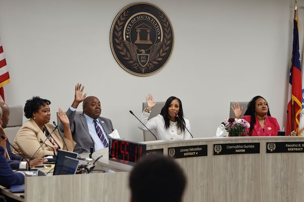 South Fulton Mayor Carmalitha Gumbs presides over a City Council meeting after being sworn in at South Fulton City Hall. She says the rezoning issue is resolved. (Natrice Miller/AJC)