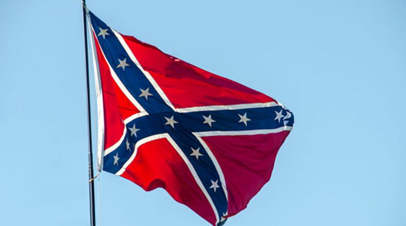 Students at West Plains High School in Missouri hoisted the Confederate battle flag in their school lunchroom in response to classmates who handed out rainbow pride flags in support of LGBTQ rights.