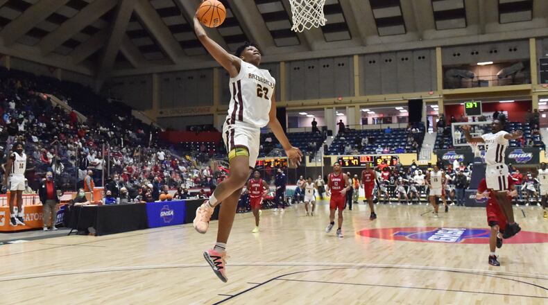 March 12, 2021 Macon - Cross Creek's Antoine Lorick (23) dunks the ball during the 2021 GHSA State Basketball Class AAA Boys Championship game at the Macon Centreplex in Macon on Friday, March 12, 2021 Cross Creek won 57-49 over Sandy Creek. (Hyosub Shin / Hyosub.Shin@ajc.com)