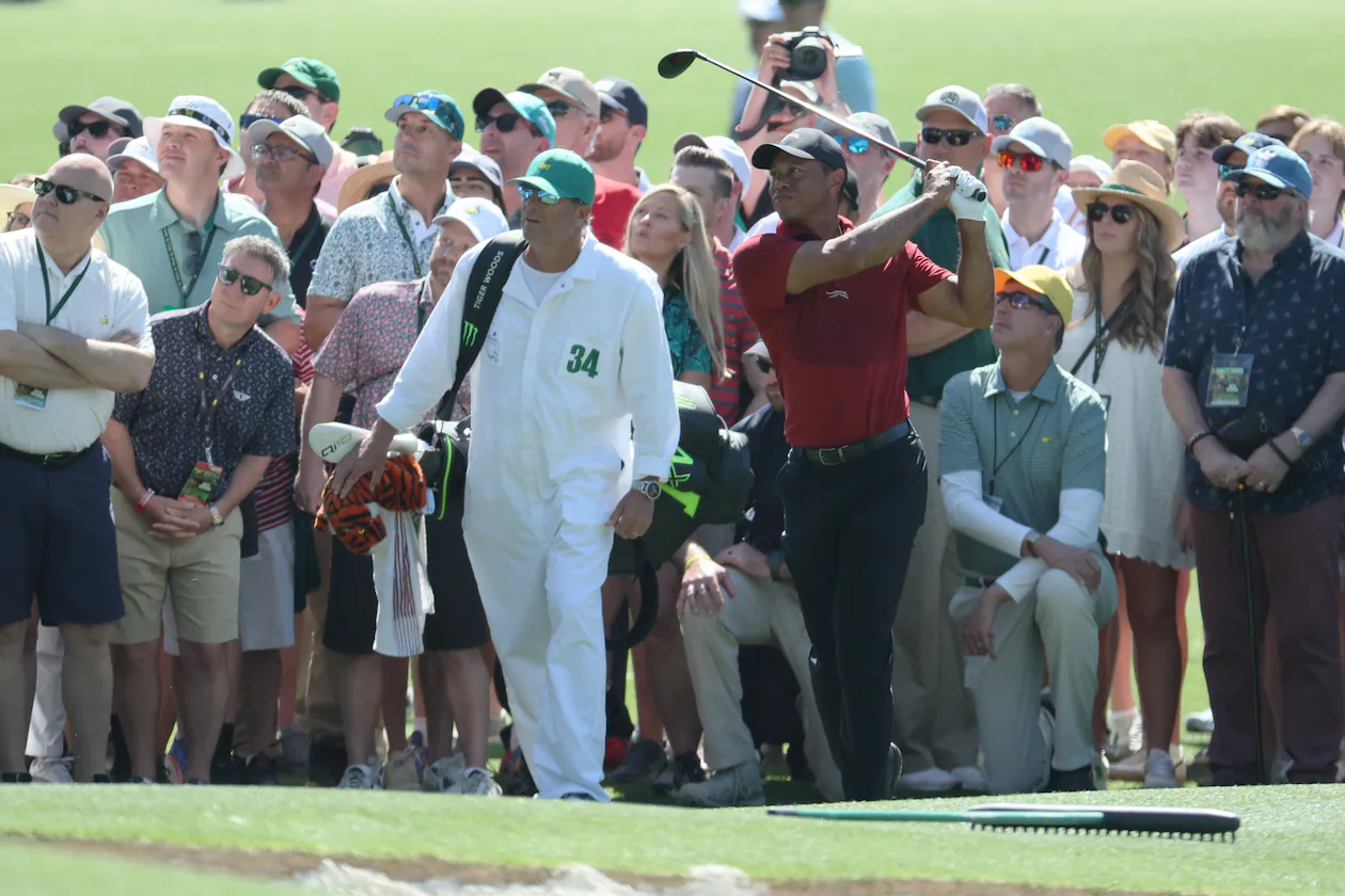 Tiger Woods hits his second shot on eighth hole during the final round of the 2024 Masters Tournament at Augusta National Golf Club, Sunday, April 14, 2024, in Augusta, Ga. (Jason Getz/AJC)