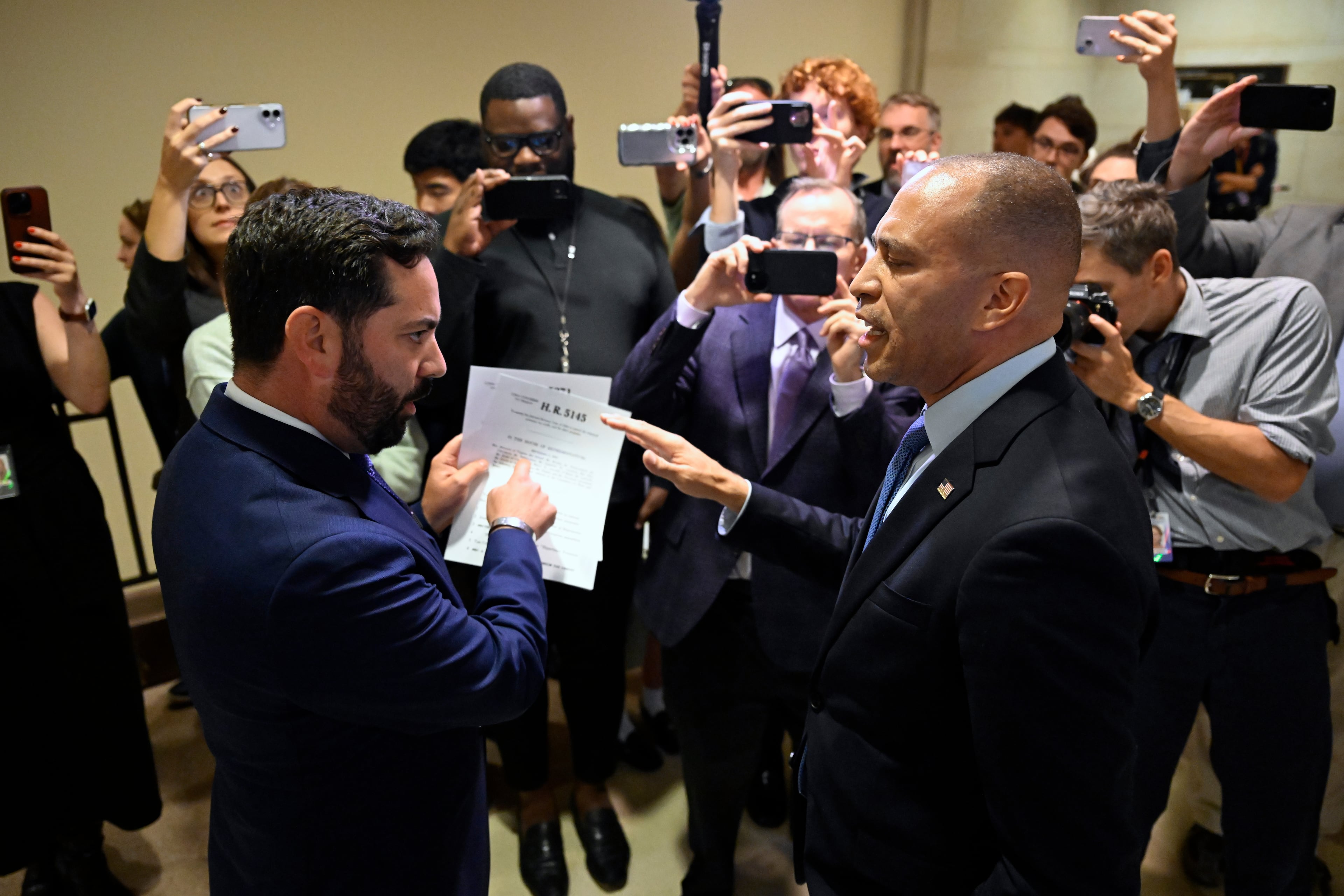 Rep. Michael Lawler, R-N.Y., (left) confronts House Minority Leader Hakeem Jeffries, D-N.Y., in a heated discussion to endorse bills that would extend the American Rescue Plan Act of 2021 and the Inflation Reduction Act of 2022, at the U.S. Capitol on Wednesday, Oct. 8, 2025, in Washington. (John McDonnell/AP)