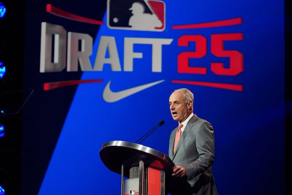 MLB Commissioner Rob Manfred speaks during the first round of the MLB baseball draft Sunday, July, 13, 2025 in Atlanta. (AP Photo/Mike Stewart)