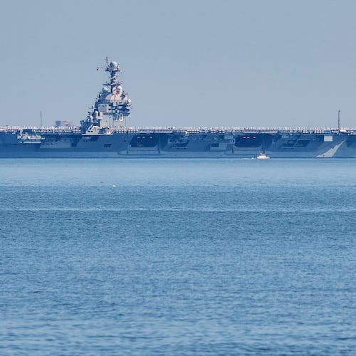FILE The USS Gerald R. Ford aircraft carrier leaves Naval Station Norfolk, June 23, 2025, in Norfolk, Va. (AP Photo/John Clark, File)