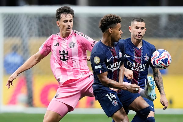 Inter Miami's Tadeo Allende, left, controls the ball against Paris Saint-Germain's Desire Doue, center, and Lucas Hernandez during the Club World Cup round of 16 soccer match between PSG and Inter Miami in Atlanta, Sunday, June 29, 2025. (AP Photo/Brynn Anderson)