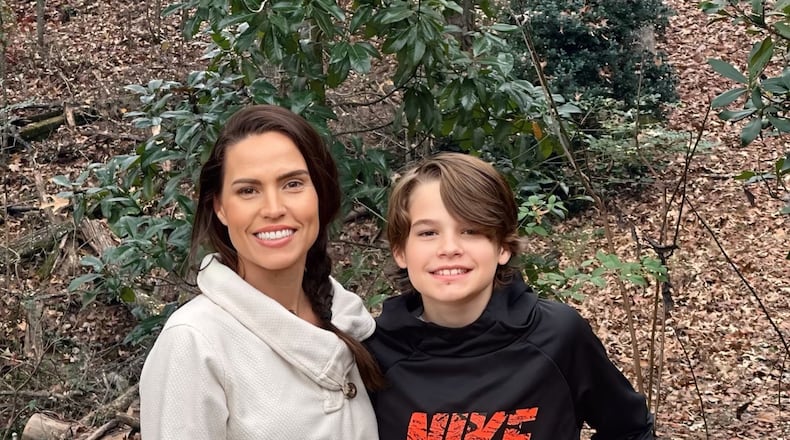 Brittany Patterson (left) was arrested after a sheriff's deputy picked up her son, Soren, who had walked less than a mile from home into their town, Mineral Bluff.