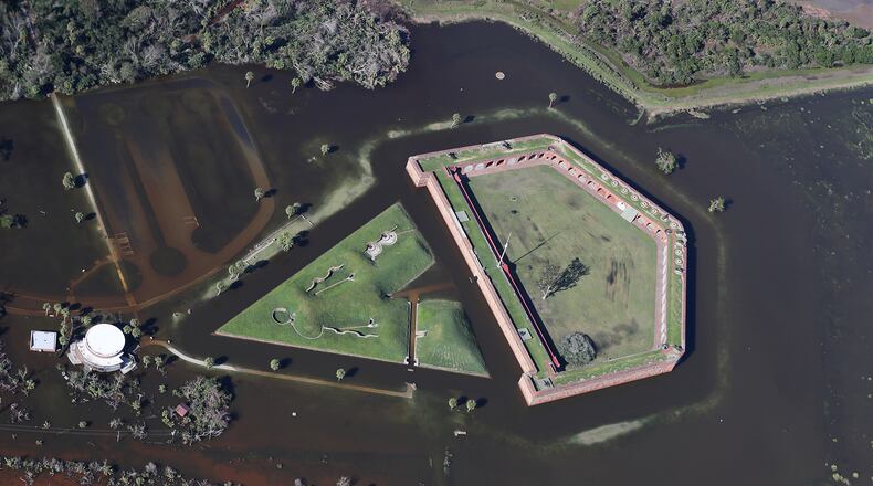 The historic Fort Pulaski National Monument is surrounded by flood waters after Hurricane Irma near Savannah on the Georgia coast. The monument preserves Fort Pulaski, where in 1862 during the American Civil War, the Union Army successfully tested rifled cannon in combat, the success of which rendered brick fortifications obsolete. The fort was also used as a prisoner-of-war camp. Curtis Compton/ccompton@ajc.com
