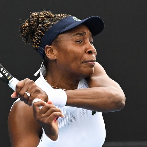 Venus Williams of the U.S. hits a backhand to Magda Linette of Poland during her singles match of the ASB Classic Women's Tennis Tournament in Auckland, New Zealand, Tuesday Jan. 6, 2026. (Andrew Cornaga/Photosport via AP)