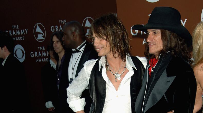 Musicians Steven Tyler (L) and Joe Perry of Aerosmith arrive at the 48th Annual Grammy Awards at the Staples Center on February 8, 2006 in Los Angeles, California. (Photo by Stephen Shugerman/Getty Images)