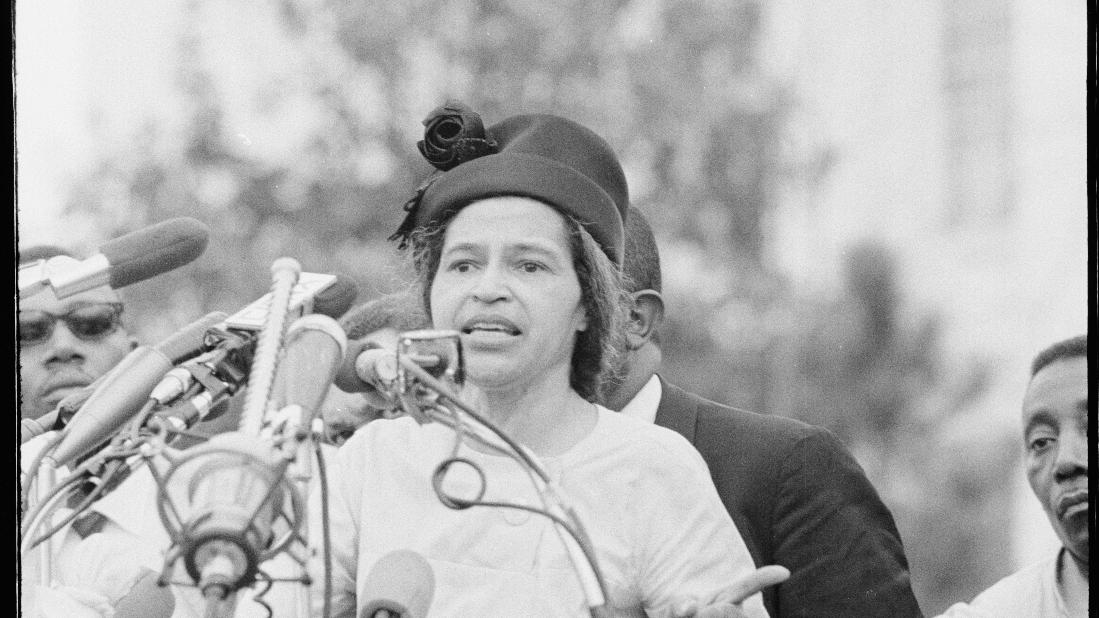 Rosa Parks delivers remarks in front of the Alabama State Capitol at the conclusion of the 54 mile march from Selma to Montgomery. Alabama State Capitol, Montgomery, Ala., March 25, 1965. (Matt Herron/Jeannine Herron and Stanford University Libraries via AP)