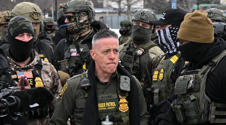 U.S. Border Patrol Cmdr. Gregory Bovino arrives as protesters gather outside the Bishop Henry Whipple Federal Building, Thursday, Jan. 8, 2026, in Minneapolis, Minn. (AP Photo/Tom Baker)