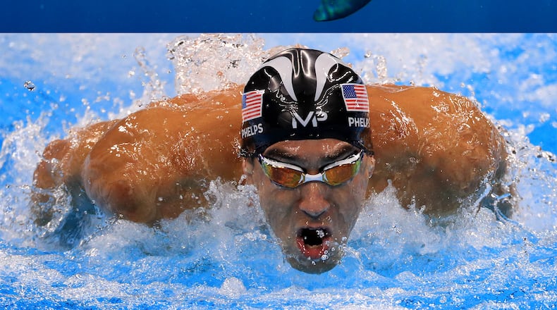 Michael Phelps will race a shark on Discovery next Sunday, July 23, 2017. I presume this will not be happening in a pool. CREDIT: (left) AP, (right) Getty Images