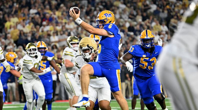 Pittsburgh quarterback Mason Heintschel and the Panther offense made plays when it counted in a 42-28 win over Georgia Tech as the defense struggled yet again. (Hyosub Shin/AJC)