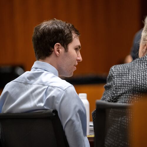 Tyler Robinson, left, speaks with his attorney Kathryn Nester in 4th District Court in Provo, Utah, on Friday, April 17, 2026. (Trent Nelson/The Salt Lake Tribune via AP, Pool)
