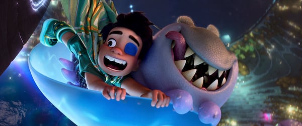 This image released by Disney/Pixar shows Elio, voiced by Yonas Kibreab, left, and Glordon, voiced by Remy Edgerly, in a scene from "Elio." (Disney/Pixar via AP)