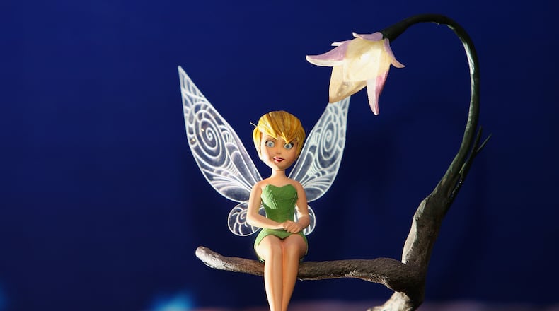 Tinkerbell may not be the Tooth Fairy, but a proud father used a fairy that looked just like her when he made a video of the Tooth Fairy's visit for his son.