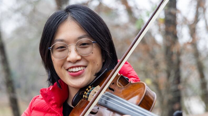 Jean Yu plays at Jones Bridge Park in Peachtree Corners. She created an organization called "Mindful Companions," that provides mindful moments and holiday concerts for seniors living communities. PHIL SKINNER FOR THE ATLANTA JOURNAL-CONSTITUTION