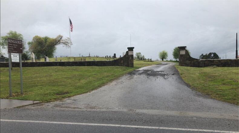 Vandals damaged Confederate graves and a flagpole at a cemetery in Ringgold.