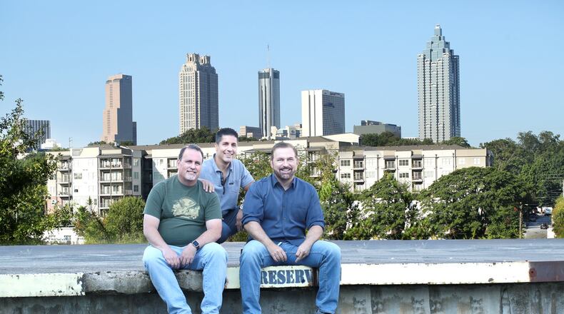From left to right: Brewmaster Mitch Steele and co-founders Carey Falcone and Bob Powers at the future home of New Realm Brewing Co. near Atlanta's Beltline. PHOTO CREDIT: Sara Hanna Photography and New Realm Brewing Co.