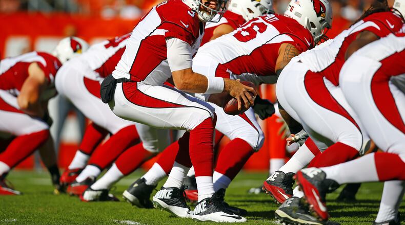 Arizona Cardinals quarterback Carson Palmer (3) takes the snap against the Cleveland Browns during an NFL football game Sunday, Nov. 1, 2015, in Cleveland. Arizona won 34-20. (Jeff Haynes/AP Images for Panini)