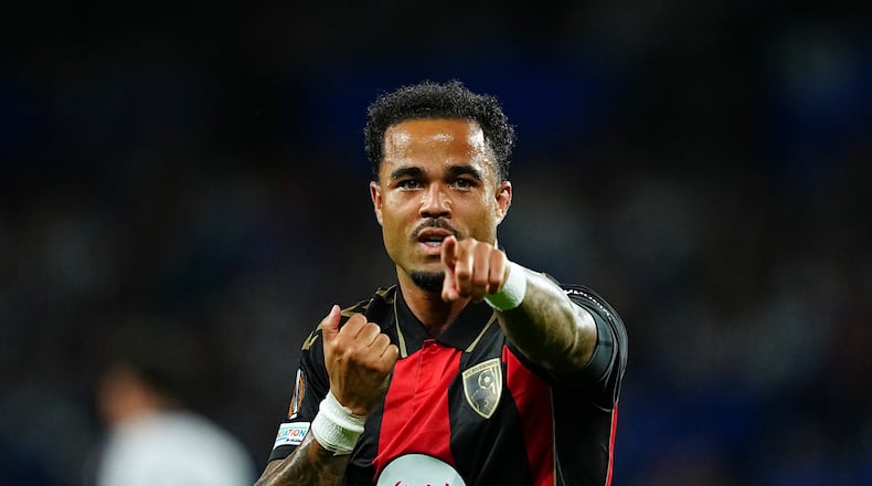 Bournemouth's Justin Kluivert celebrates after scoring the opening goal during the Europa League opening phase soccer match between Real Sociedad and AFC Bournemouth in San Sebastian, Spain, Thursday, Sept. 17, 2026. (AP Photo/Miguel Oses)