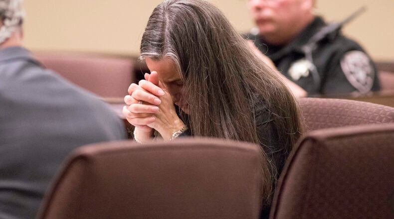 Nydia Tisdale becomes emotional while evidence is presented during a trial at the Dawson Superior Court Nov. 30, 2017. Tisdale was convicted of a misdemeanor, fined $1,000 and ordered to perform community service in connection to a Republican Party function in 2014 she tried to videotape. ALYSSA POINTER/ALYSSA.POINTER@AJC.COM