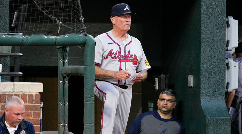 Atlanta Braves manager Brian Snitker looks on from the dugout during the sixth inning of a baseball game against the Baltimore Orioles, Tuesday, June 11, 2024, in Baltimore. (AP Photo/Jess Rapfogel)