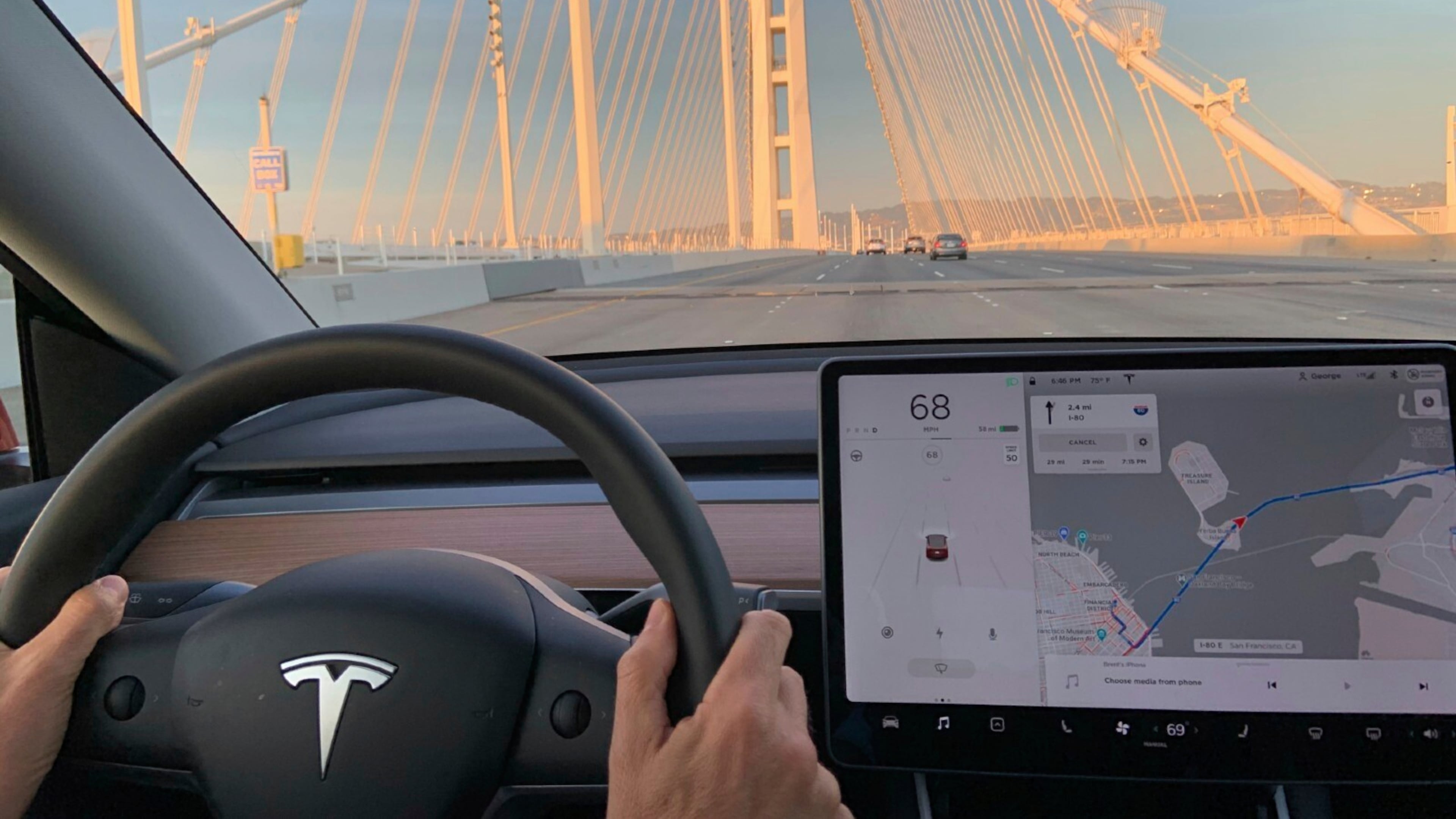 This photo provided by Edmunds shows the interior a 2020 Tesla Model Y while driving on the highway. A vehicle equipped with forward collision warning can alert a driver if the system detects that a frontal collision is likely or imminent. (Courtesy of Edmunds via AP)