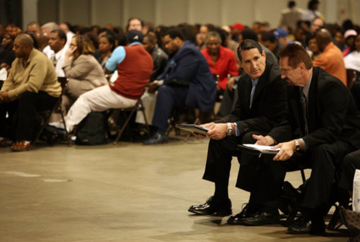 Job hunters line up at career fair