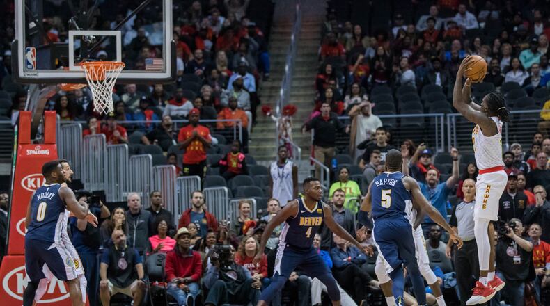 Atlanta Hawks forward Taurean Prince (12) takes a shot during an NBA game against the Denver Nuggets at Philips Arena, Friday, Oct. 27, 2017, in Atlanta. BRANDEN CAMP/SPECIAL