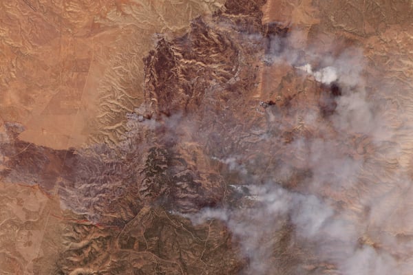 This satellite image provided by Planet Labs PBC shows smoke from the White Sage Fire in Coconino County, Arizona, on Sunday, July 13, 2025. (Planet Labs PBC via AP)