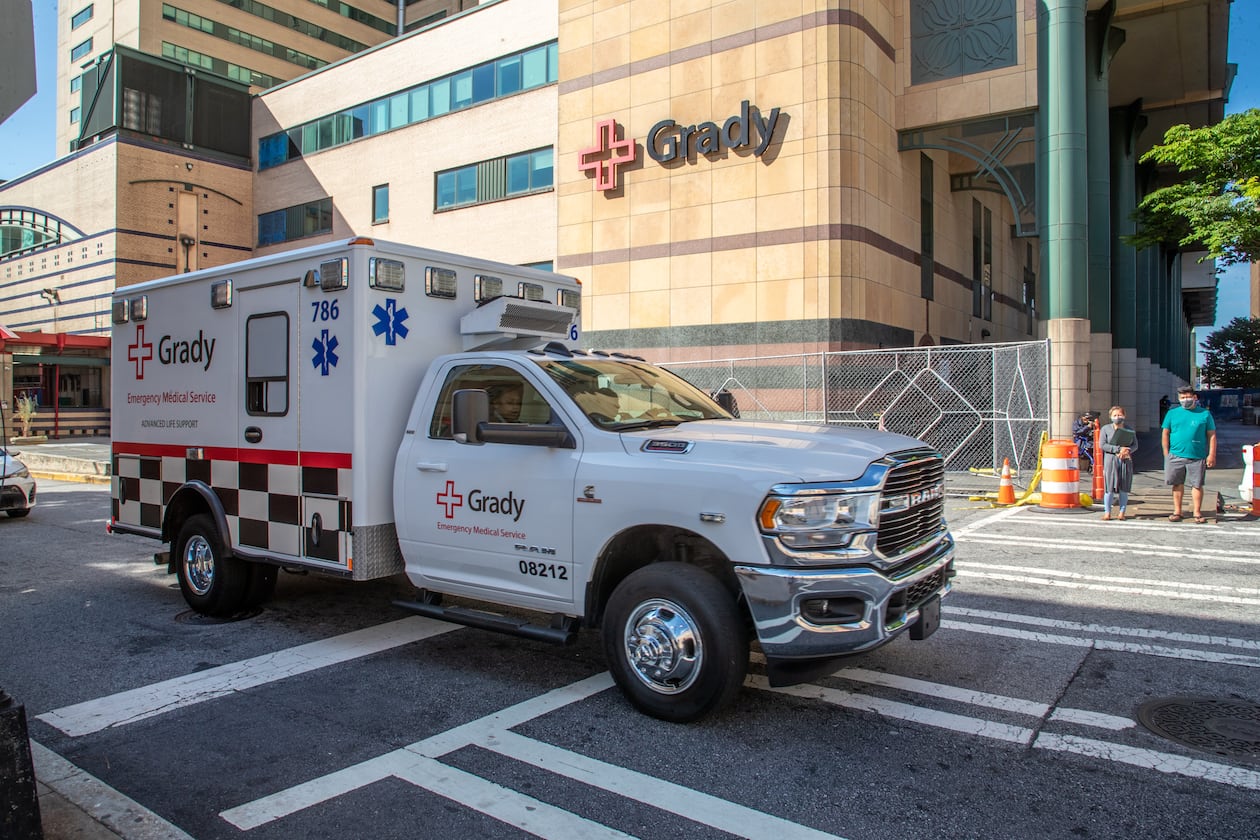 An ambulance leaves Grady Memorial Hospital in Atlanta. Grady’s administration said nurses and other unspecified employees who receive block pay will see a 40% reduction in those rates beginning Sept. 26. (Steve Schaefer/AJC 2022)