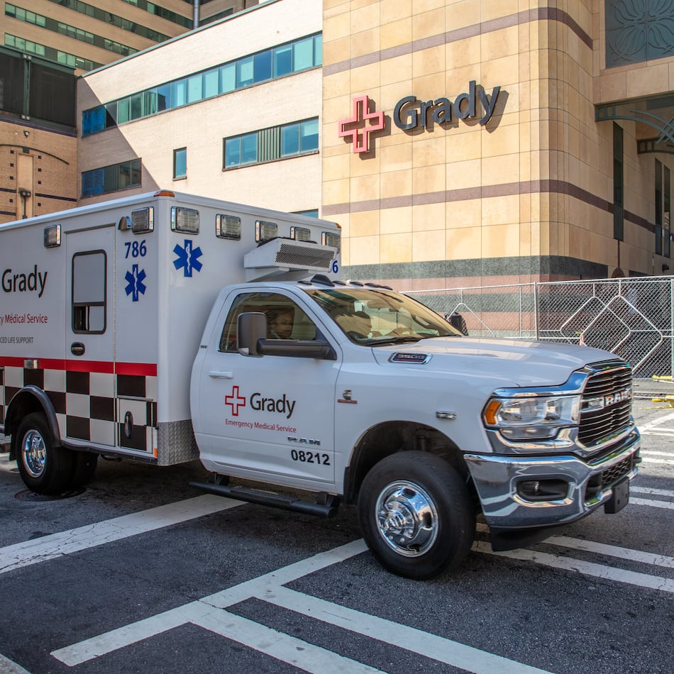 An ambulance leaves Grady Memorial Hospital in Atlanta. Grady’s administration said nurses and other unspecified employees who receive block pay will see a 40% reduction in those rates beginning Sept. 26. (Steve Schaefer/AJC 2022)