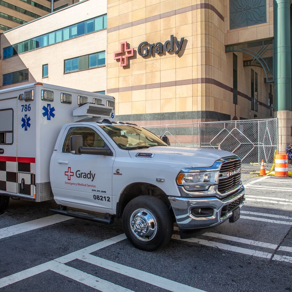 An ambulance leaves Grady Memorial Hospital in Atlanta. Grady’s administration said nurses and other unspecified employees who receive block pay will see a 40% reduction in those rates beginning Sept. 26. (Steve Schaefer/AJC 2022)