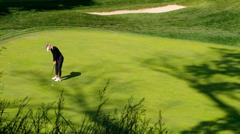 Nelly Korda putts on the 17th hole during the first round of the Queen City Championship LPGA golf tournament at Maketewah Country Club, Thursday, May 14, 2026, in Cincinnati. (AP Photo/Jeff Dean)