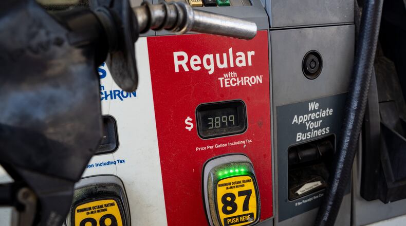 Gov. Brian Kemp on Friday extended the gas tax holiday for another two weeks as summer travel season is about to kick off and motorists deal with the highest fuel prices in four years. (Ben Hendren for the AJC)