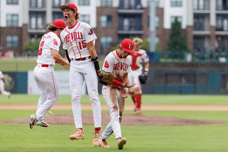Loganville first basemen Zac Cuneio (left center) celebrates after Loganville beat Pope the seventh inning of Game 1 of the GHSA Class 5A baseball state championship series Monday, May 25, 2026, at Gwinnett Field in Lawrenceville. (Estela Muñoz/AJC)