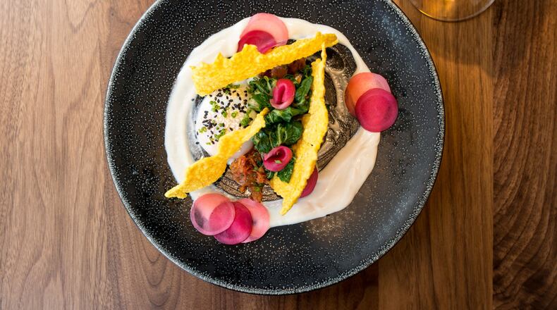 The Alden Pan Asian Egg with a soft coddled farm egg, bok choy, ginger, and rice cracker. Photo credit- Mia Yakel.