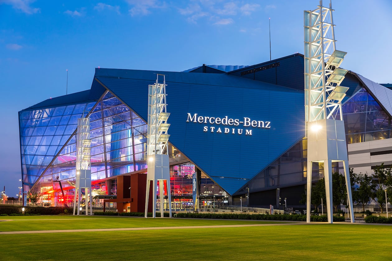 A general view of the exterior of Mercedes-Benz Stadium, as seen from the International Plaza, after sunset, Thursday, August 24, 2017 in Atlanta. (Paul Abell via Abell Images for Chick-fil-A Peach Bowl)