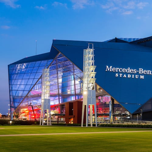 A general view of the exterior of Mercedes-Benz Stadium, as seen from the International Plaza, after sunset, Thursday, August 24, 2017 in Atlanta. (Paul Abell via Abell Images for Chick-fil-A Peach Bowl)