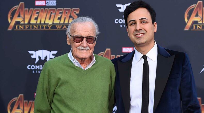 In this April 23, 2018, file photo, Stan Lee, left, and Keya Morgan arrive at the world premiere of 'Avengers: Infinity War' in Los Angeles. Morgan, the former business manager of Lee has been arrested on elder abuse charges involving the late comic book icon.