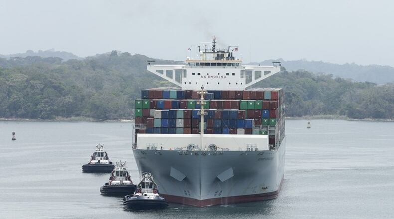 The Neopanamax Cosco Development cargo ship sails in Gatun Lake as it lines up to make it through Agua Clara locks on the newly expanded Canal in, Panama, Tuesday, May, 2, 2017.