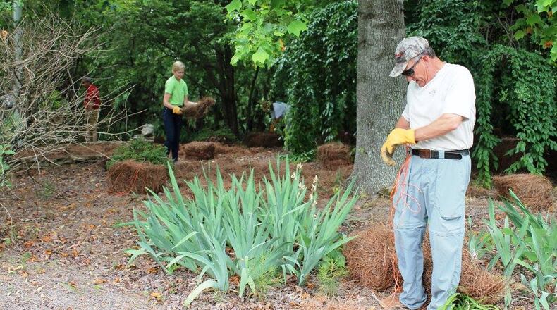 The Duluth N.O.W. (Neighborhood Outreach Work) program partners neighborhoods with city staff to identify and address community concerns. Shown here, Rotary Club members at Bunten Road Park. (Courtesy City of Duluth)
