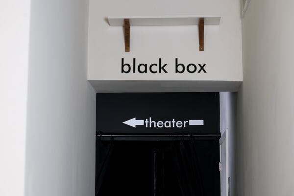 The unassuming entrance to the black box theater at Vesper Theatre. (Jason Getz/AJC)