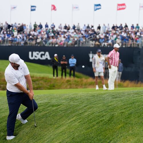 Chris Gotterup chips to the green on the 11th hole during the first round of the U.S. Open golf tournament at Shinnecock Hills Golf Club in Southampton, N.Y., Thursday, June 18, 2026.(AP Photo/George Walker IV)