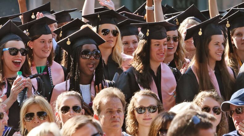 Nursing graduates cheer during the conferral of their degrees during a May 2015 commencement at Emory University. A shakeup at the Georgia Board of Nursing, which regulates nursing programs in the state, has the nursing community nervous. BOB ANDRES / BANDRES@AJC.COM