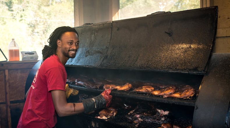 Bryan Furman in the smokehouse at B’s Cracklin’ Barbecue in Riverside. CONTRIBUTED BY MIA YAKEL